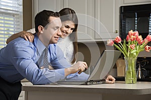 Couple with laptop.