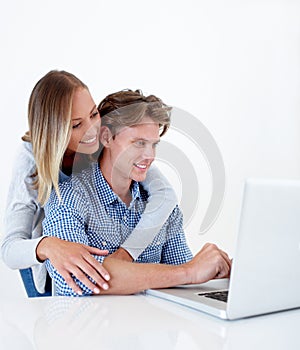 Couple, laptop and hug with email, online information and social network scroll with a smile. Marriage, computer and