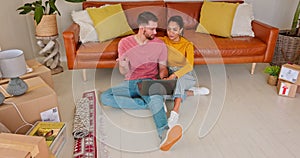 Couple, laptop and planning for furniture in new home, online shopping or house decor together. Interracial Man and