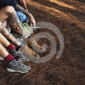 Couple Legs Relaxing Camping Outdoors Concept