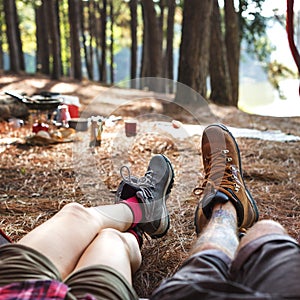 Couple Legs Relaxing Camping Outdoors Concept