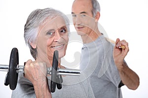 Couple lifting weights