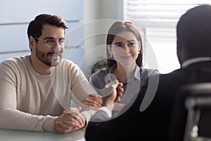 Couple listen African financial advisor consults about mortgage getting possibility