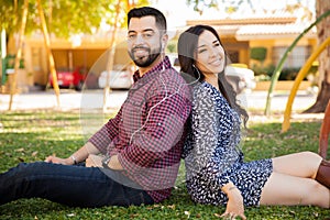 Couple listening to music outdoors