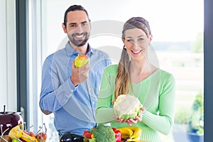 Couple living healthy eating fruits and vegetables