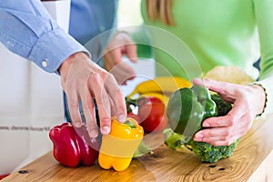 Couple living healthy eating fruits and vegetables