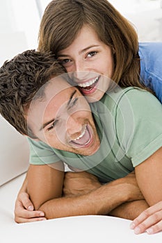 Couple in living room smiling