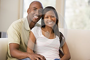 Couple in living room smiling