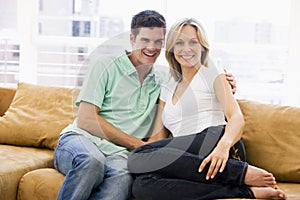 Couple in living room smiling