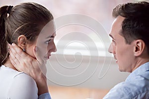 Couple looking at each other with love and tender