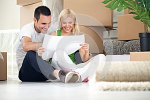 Couple looking at house plans