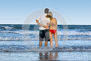 Couple looking out to sea