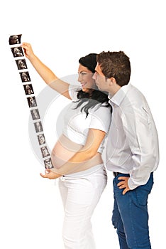 Couple looking at sonogram images