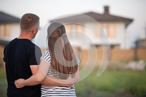 The couple looking at their home