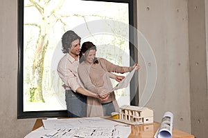 Couple looks at plans