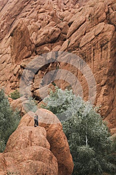 Couple in love on background of Todra gorge canyon landscape in Morocco