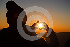 Couple in love backlight silhouette on hill