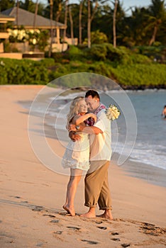 Couple in love on the beach in Hawaii
