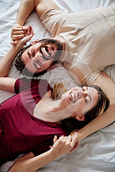 couple love bedroom bed lying romance happy relationship valentine day together man woman