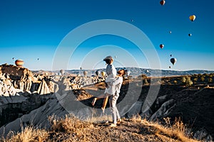 A couple in love in Cappadocia. The couple travels the world. Vacation in Turkey. Honeymoon in Cappadocia. Happy couple traveling