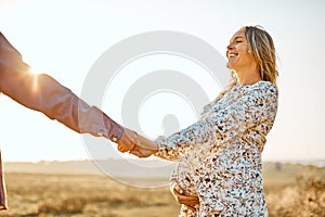 Couple in love caucasian man and woman holding hands outdoors