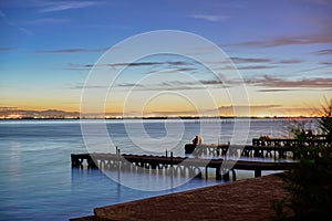 Couple in love contemplate the Sunset in the Albufera of Valencia