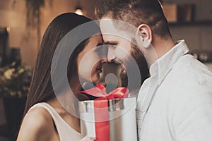 Couple in love embracing looks each other the eyes