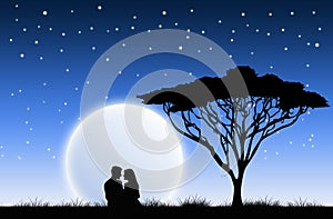 Couple in love enjoying the moon