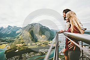 Couple in love enjoying mountains view traveling together