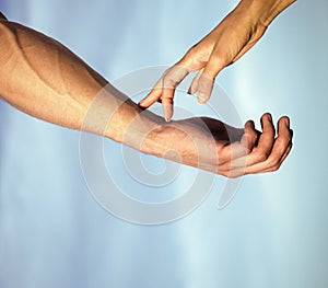 Couple in love. Female fingers touching male arm skin with veins
