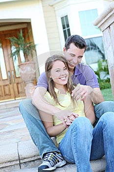 Couple in Love in Front of Home
