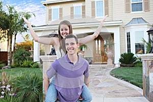 Couple in Love in Front of Home