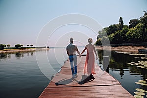 couple love go together hugs autumn landscape