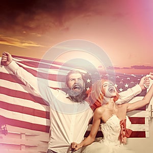 Couple in love. Happy couple hold american flag