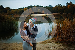 Couple In Love Have A Romantic Time In Autumn Park