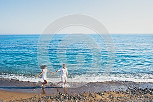 Couple in love having fun on the beach