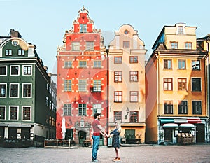 Couple in love holding hands together in Stockholm