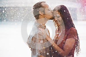 Couple in love hugging and kissing photo