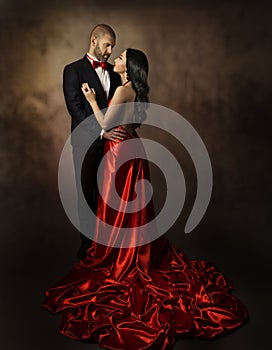 Couple in Love, Lovers Woman and Man, Glamour Classic Suit and Dress with Long Tail, Fashion Beauty Portrait of Young Models