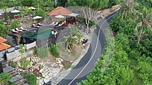 Couple in love at luxury resort on romantic summer vacation. People relaxing together in edge swimming pool , enjoying