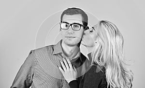 couple in love. man and woman embrace. smart looking guy wear glasses. sexy bonde girl kiss and hug her boyfriend. happy photo