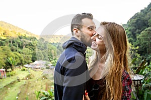 Couple in love with the mountains in the tropics