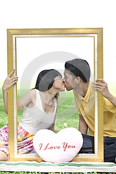 Couple in love with rectangle frame
