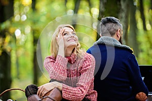 Couple in love relax in autumn forest with laptop. Family picnic. Relationship. camping and hiking. happy girl dreaming