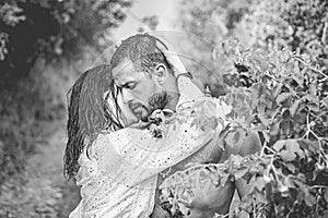 Couple in love. Sensual couple in the garden hugging. Love in the garden. photo