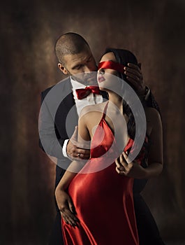 Couple in Love, Fashion Woman and Man, Girl with Red Band on Eyes Charming Boyfriend in Suit, Glamor Model Portrait