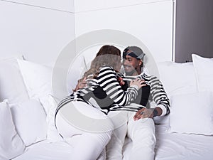 Couple in love sitting on couch