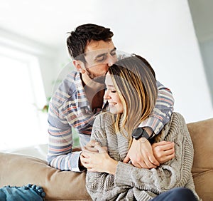 couple love sofa home hug romance happy relationship valentine day