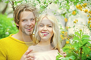 Couple in love in spring, easter. Love and romance, relationship, happy people. Sensual woman and man in cherry bloom.