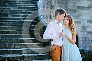 Couple in love strolling around an old castle